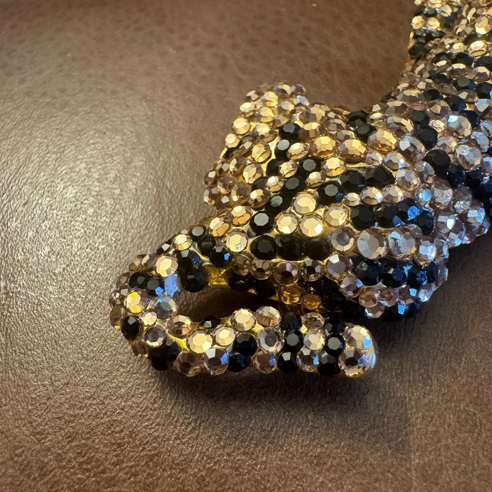 VTG gold tone articulated black & champagne rhinestone detailed tiger brooch
